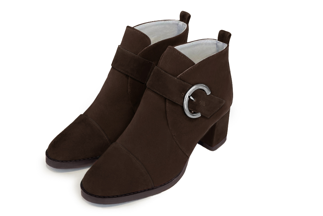 Dark brown women's ankle boots with buckles at the front. Round toe. Medium block heels. Front view - Florence KOOIJMAN